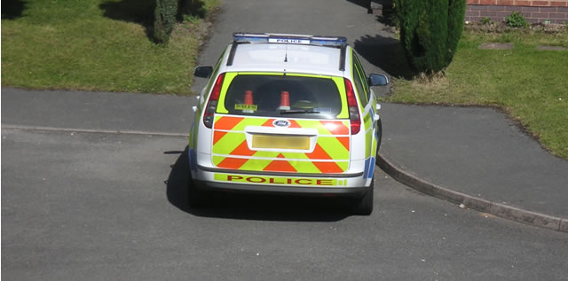 Police car on driveway