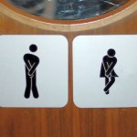 Crossed legs toilet signs