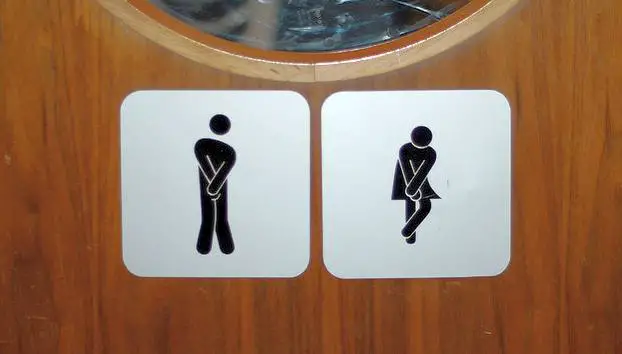 Crossed legs toilet signs