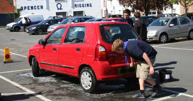 Scouts washing cars: