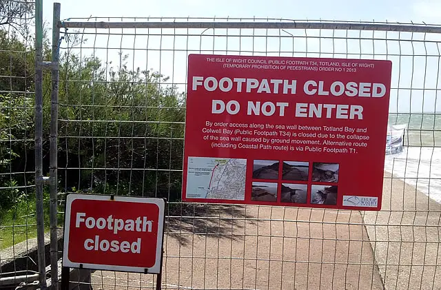 Sign showing footpath closed due to Totland landslip