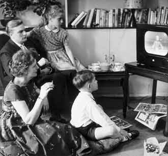 Family watching TV: