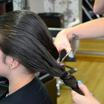 Chloe having her ponytail cut
