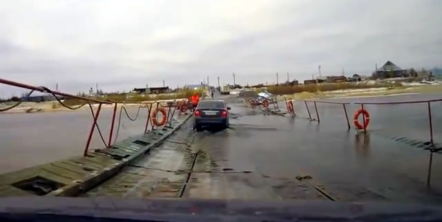 Barely floating bridge Russia - YouTube grab