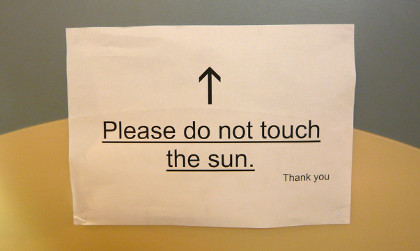 Do not touch sun notice :