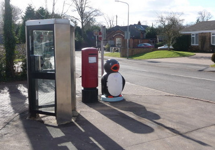 Penguin and phone box: