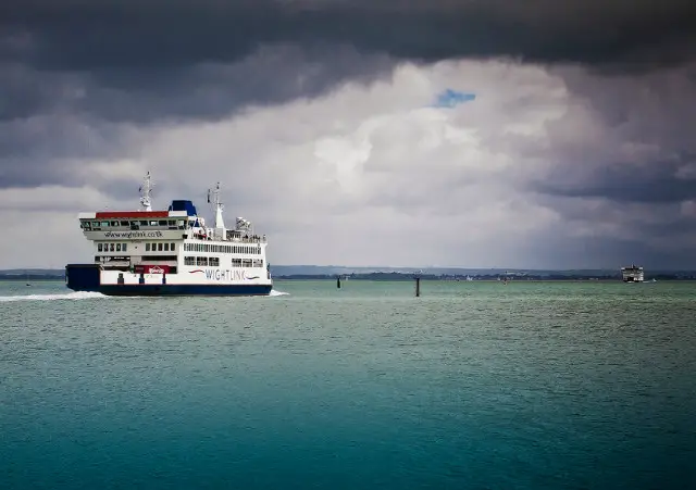 Wightlink ferry under dark clouds