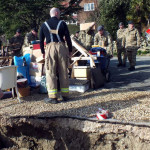 Items outside a house (crop) - Army and firemen - Undercliff landslip Feb 2014 by IWC