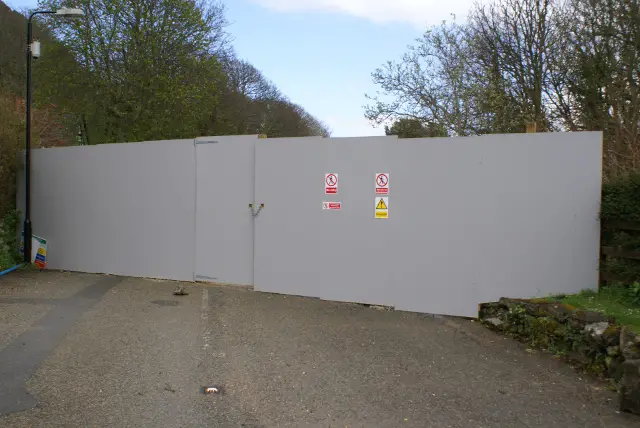Undercliff Drive - Solid hoardings erected by Island Roads