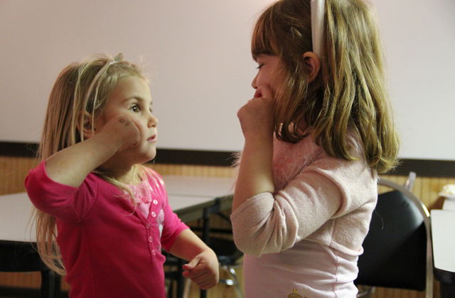Children using sign language: