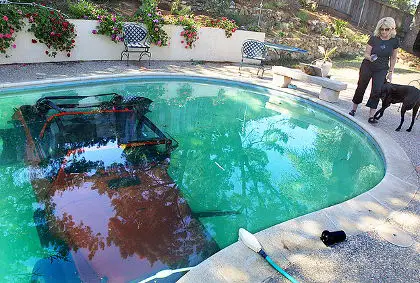 Car in swimming pool: