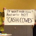 Cash Cowes Banner at public meeting