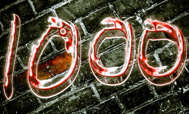 1000 in light traced writing: