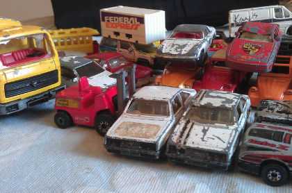 Battered old toy cars: