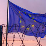 EU flag behind barbed wire by windytan