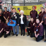 Mick and Mavis Furnell with Sainsbury's staff