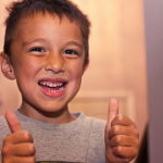 Thumbs up - young boy: