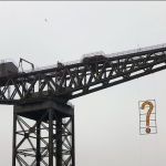 Crane and question mark