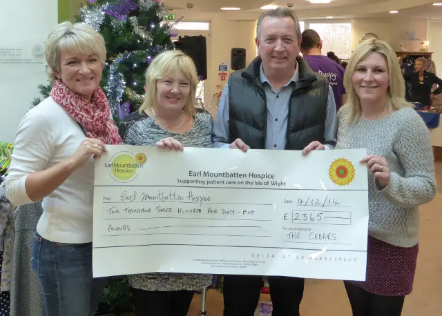 Cheque being presented to the Hospice