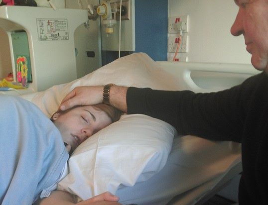 Sam Farren in hospital bed - cropped