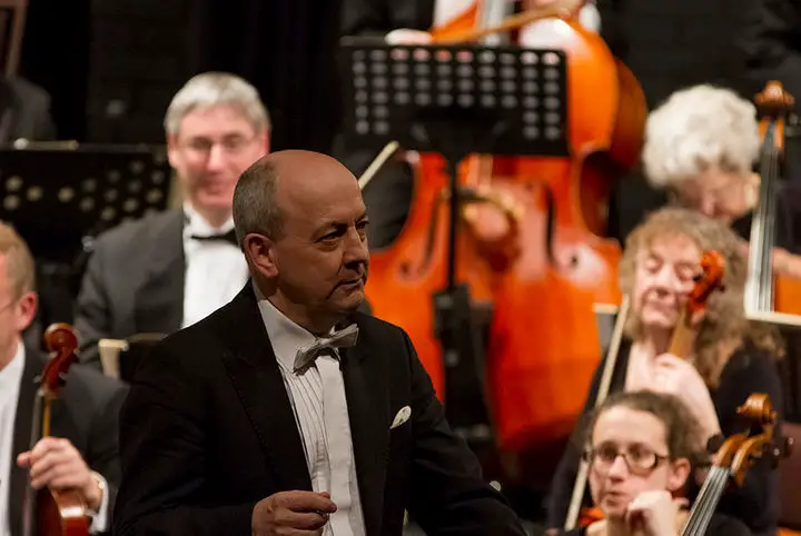 Condutor Jonathan Butcher at March 2015 IWSO concert by Allan Marsh