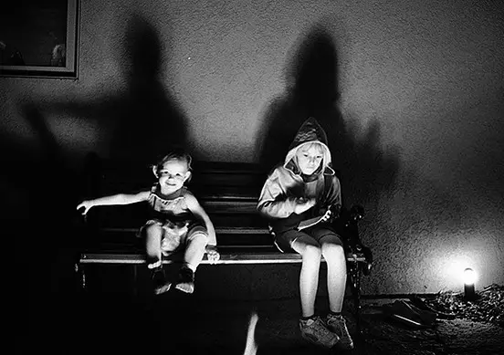 children in torchlight