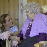 Elderly lady with nurse