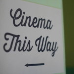 Cinema this way sign