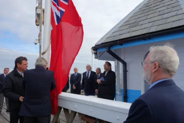 Raising the red ensign in Yarmouth 2015