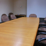 Empty meeting room by Michael Coghlan