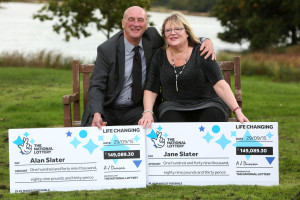 Jane and Alan Slater - Isle of Wight lottery winners - With cheques