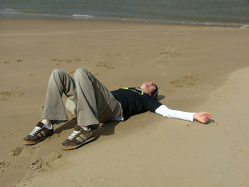 Lying on sand - 