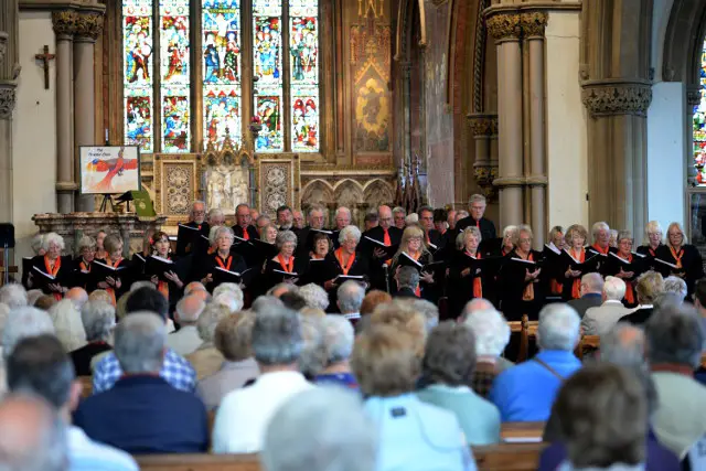 The Phoenix Choir performing in All Saints Church.