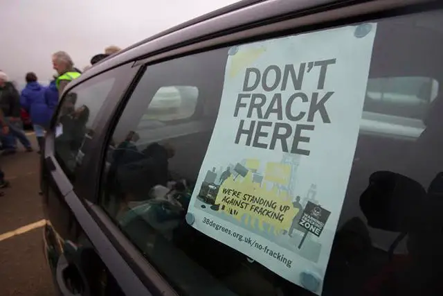 Anti Fracking demonstration, Compton Bay, Isle of Wight, England, 31 Janaury 2016,  About 80 people braved the wind and the rain to demonstrate in the car park at Compton Bay, against onshore and offshore fracking operations. That hydraulic fracturing is planned for the Island has been confirmed by Solo Oil in a recent press statement. Compton Bay is National Trust land and part of an area of outstanding natural beauty. It is also part of the Jurassic Coastline famed for fossils.