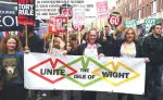 unite the iw at demo with banner