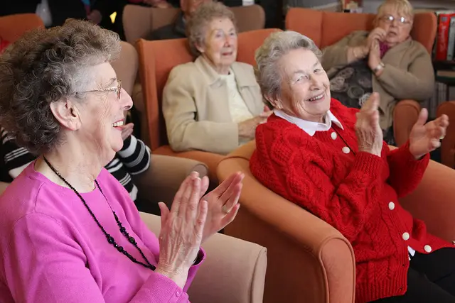 elderly people clapping