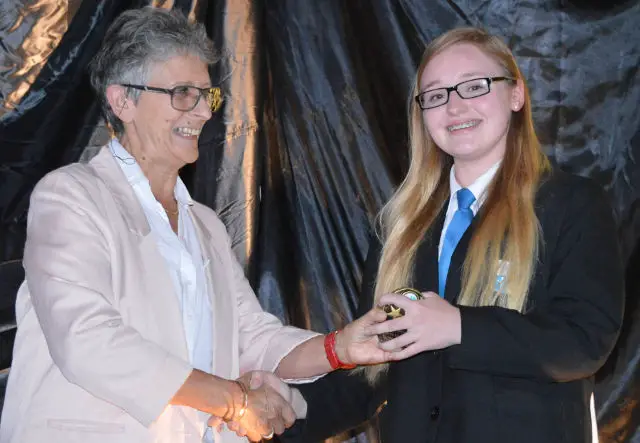 Julia Banachowska age 15 receiving her award from Dame Janet Paraskeva
