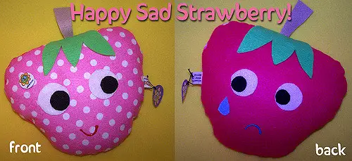 happy and sad strawberries 