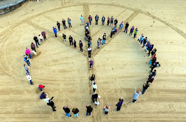 Human peace sign by Darren Vaughan WightDrone