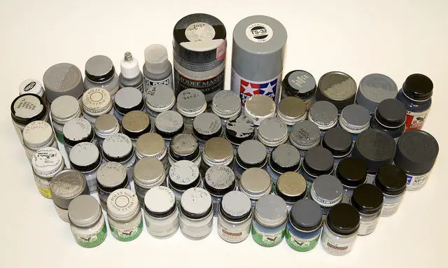 paint pots and aerosol cans-