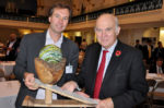 Former Business Secretary Sir Vince Cable (right) and Future South board member Andy Stanford-Clark with the David Green Award trophy. The award honours innovation in low carbon business.