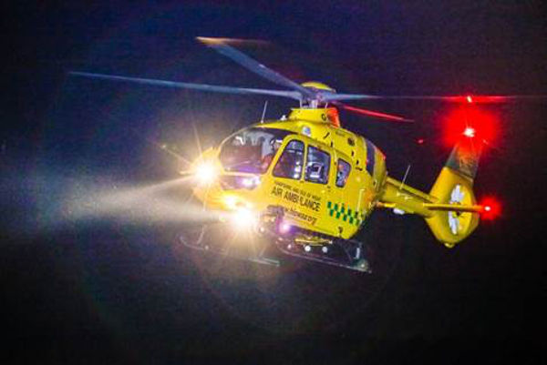 air ambulance in the sky at night