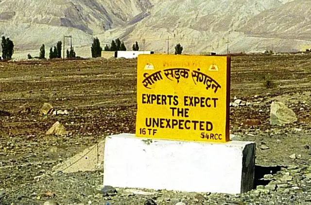 Sign reading Expect the unexpected