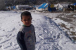 Syrian refugee child in snow