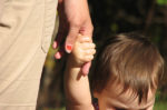holding child hand