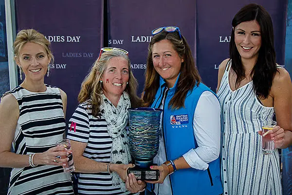Ladies Day trophy winner Hannah Stodel receiving the Ladies Day Trophy from the previous year's winner Libby Greenhalgh