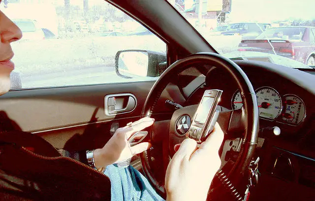 Hand held phone in car 