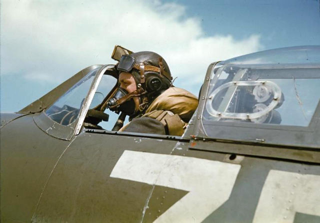 Spitfire pilot ready in cockpit 