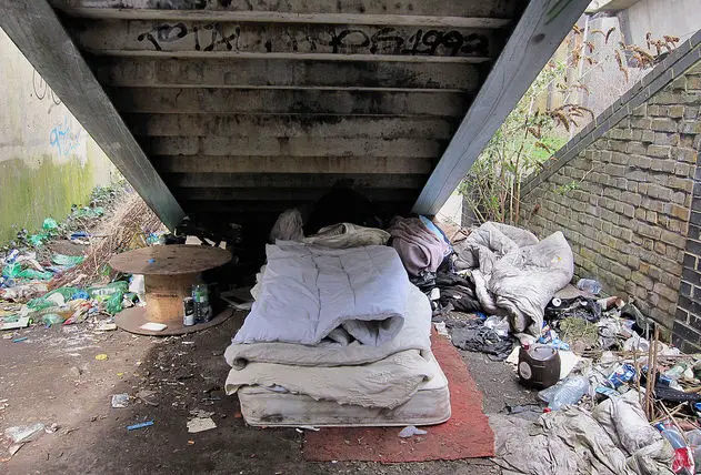 homeless bedding under steps