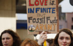 fossil fuel free march banners